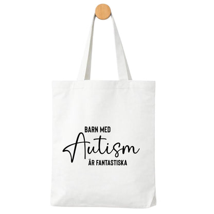 Barn med Autism är Fantastiska Tygpåse - Hylla det unika – ett viktigt budskap!