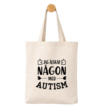 Jag älskar någon med Autism - Tygpåse  💙 Kärlek & acceptans – bär ditt stöd med stolthet!